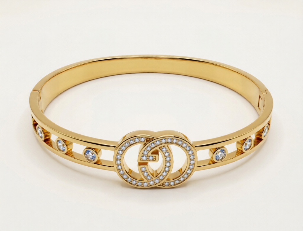 GUCCI HAND CUFF, GOLD PLATED WITH AMERICAN DIAMOND
