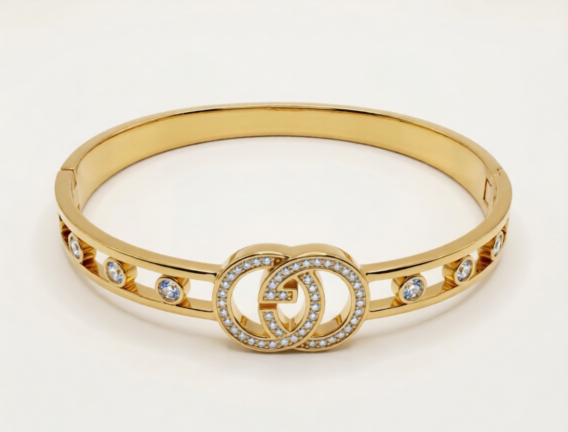 GUCCI HAND CUFF, GOLD PLATED WITH AMERICAN DIAMOND