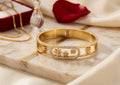 HAND CUFF, GOLD PLATED WITH AMERICAN DIAMOND