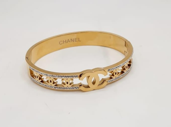 CHANEL HAND CUFF, GOLD PLATED WITH AMERICAN DIAMOND